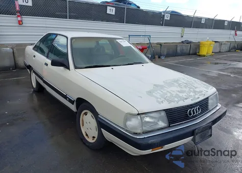 1990 Audi 100 z USA, uszkodzony, nr VIN WAUBC5445LN067143